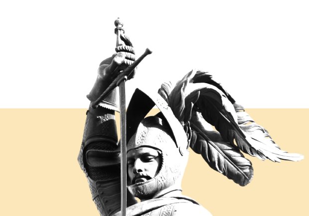 A statue in a pose that symbolizes the warrior archetype